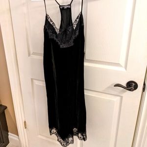 Black slip dress with lace trim